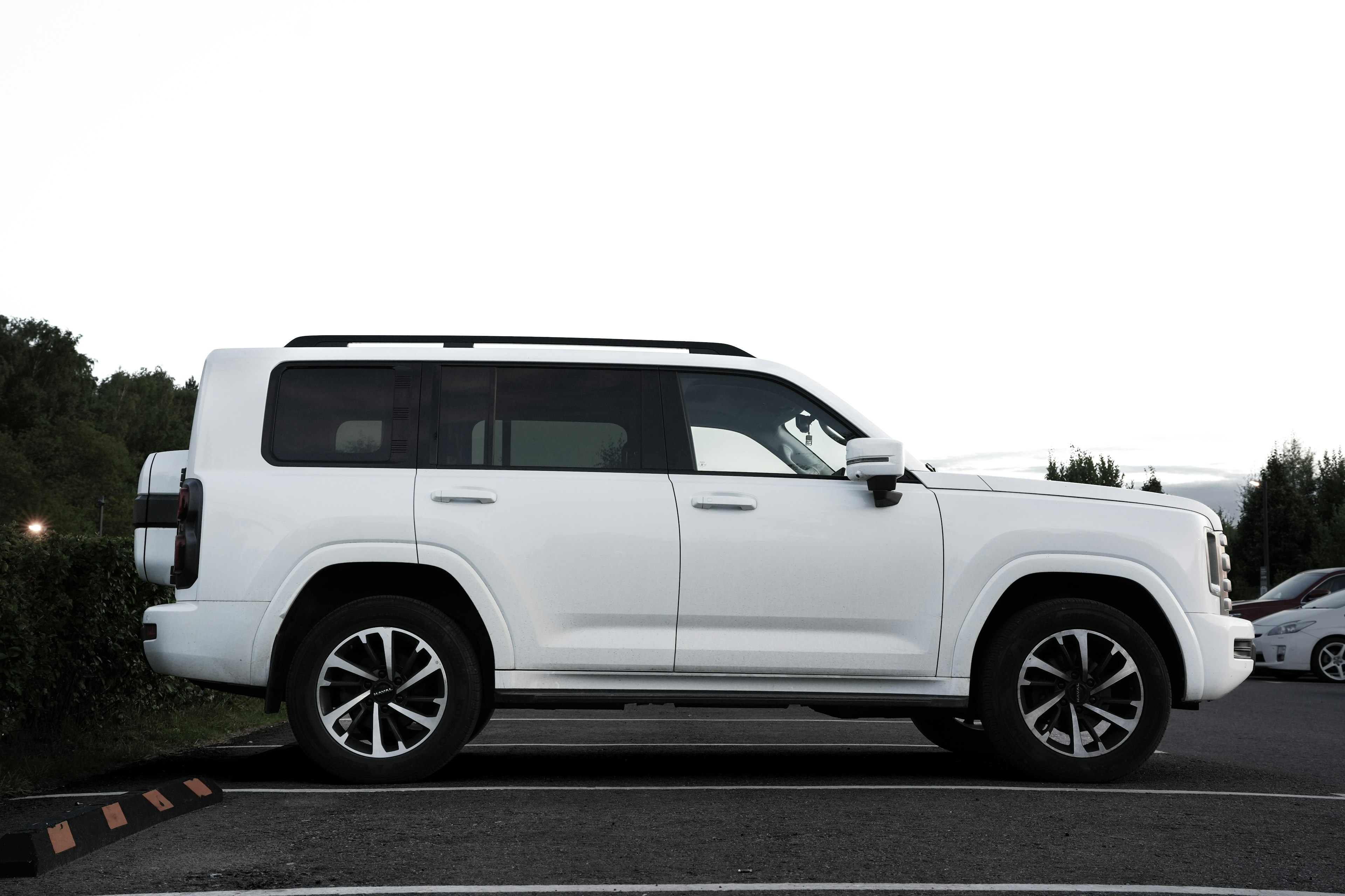 Spacious white 7-seater SUV for family transfers in the UAE