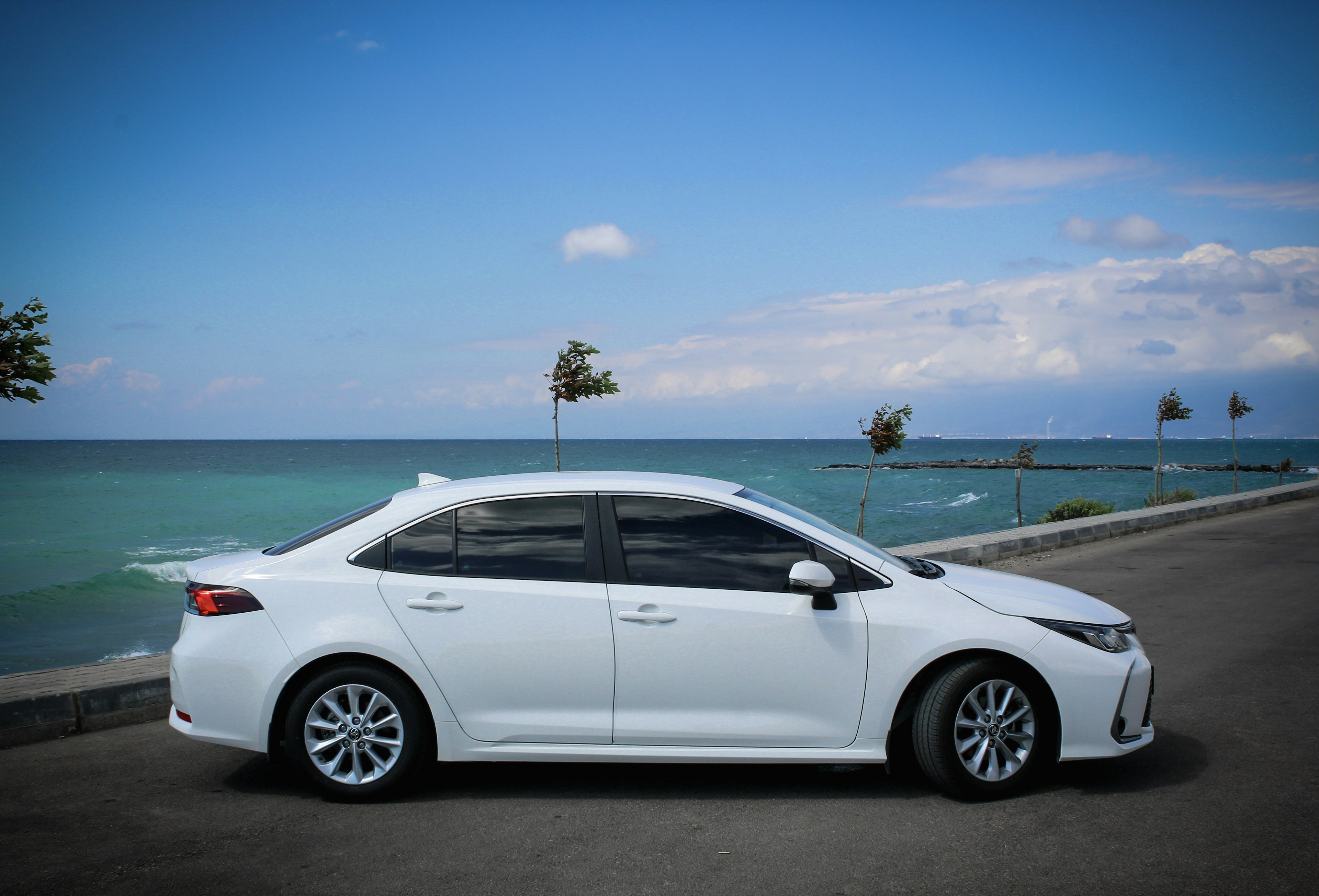 White luxury sedan available for hire in Dubai